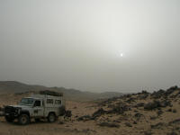 Sunset obscured by the dust