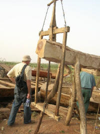 Low technology wood saw, still used on palm tree trunks.