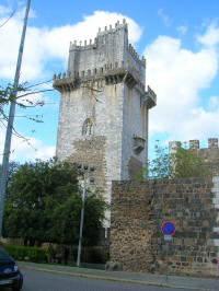 The castle tower. The grey stones are part of the reconstruction
