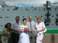 Wedding photos in front of the Cruiser Aurora, a naval museum