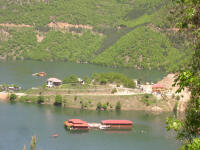 Reused flooded houses on the Vcha Dam