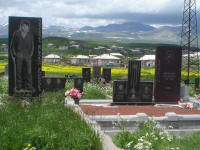 Graves with a carving of the deceased