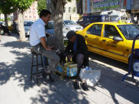 There are lots of shoe shine stands