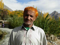 Man with hair coloured with Henna