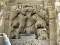 Lakshmi being bathed by 2 elephants