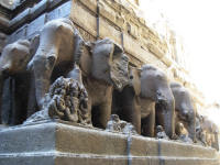 Elephants surround the temple