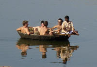 Crossing the river in a coracle