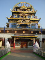 The Golden Temple with the Buddhist Wheel on top