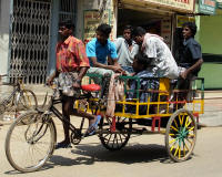 Bicycles are used to carry goods and passengers