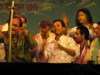 Musicians throwing coloured powder