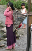 Adi woman with typical carry basket (Jay)