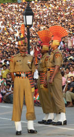 Indian soldiers have much more colourful uniforms and bigger crowds