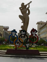 The rings with the animals and a permanent statue of a dancer
