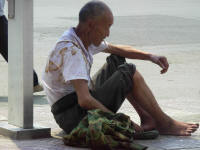 An old man resting from his labours