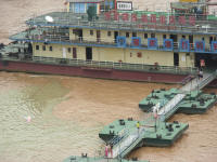 The relatively clear Jialing River meets the muddy Yangtze