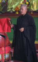 A nun chanting a prayer 