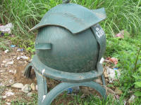 Typical Lao rubbish bin made of rubber. Looks like recycled tyres.