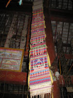 Embroidered prayer flags in the temple