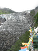 The section we could see with some strange formation at the top and prayer flags from the wooden walkway