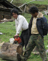 Men cutting wood