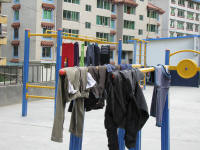Washing hanging on the exercise bars