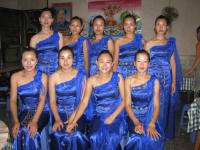 Dai women in blue with gold embroidery