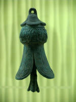 Delicate flower shaped bronze bell