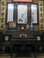 Desk with clock, vase and mirror plus chinese sayings