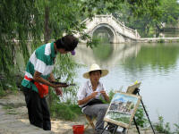 Student artists by the lake