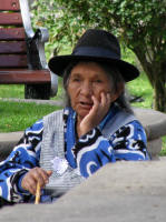 Old woman selling bird seed