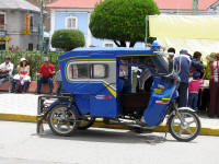 Moto taxi - fully enclosed for cold or wet weather. They are used through out Peru