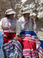 Two women in the local dress.