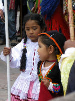 Little girls holding the canopy