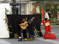 Street musician with all the bells and whistles