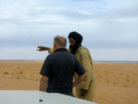 A lone Arab in the desert.