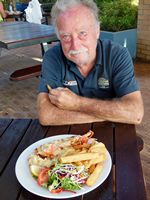Pieter and the crayfish. Yes thats a chip in his hand!